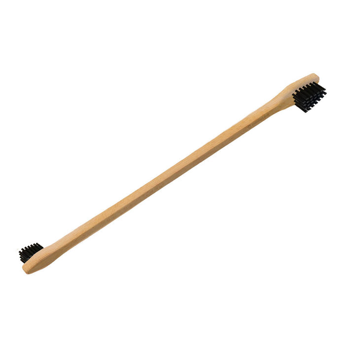 Bamboo toothbrush with black bristles on a white background.