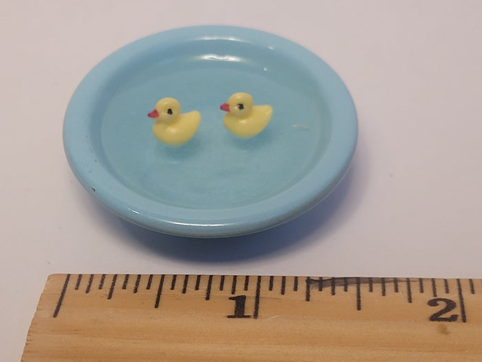 Rubber Ducks in Blue Wash Basin