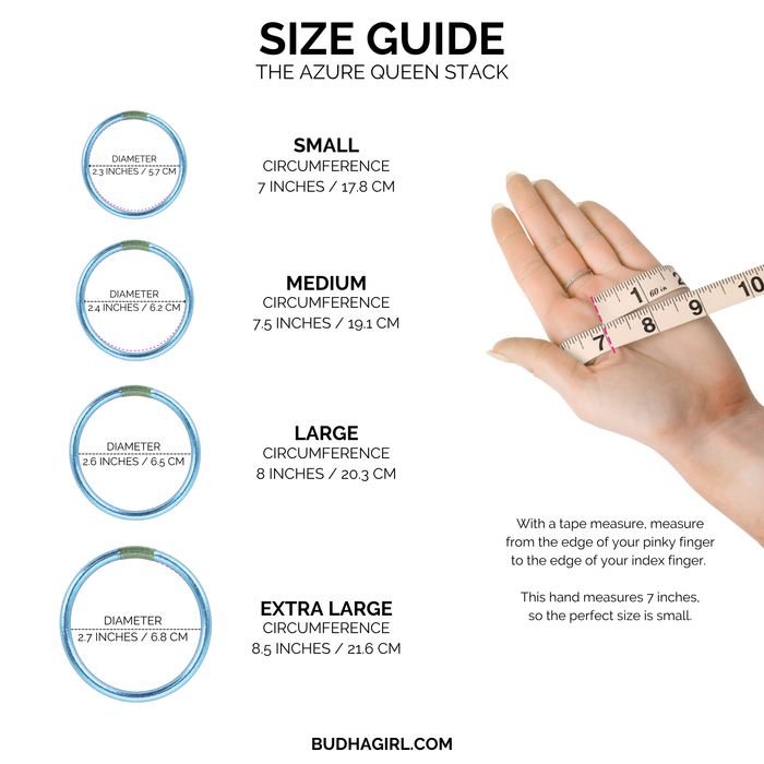 a hand holding a ruler