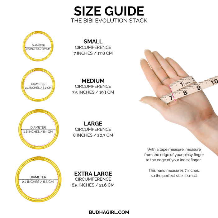 a hand holding a measuring tape