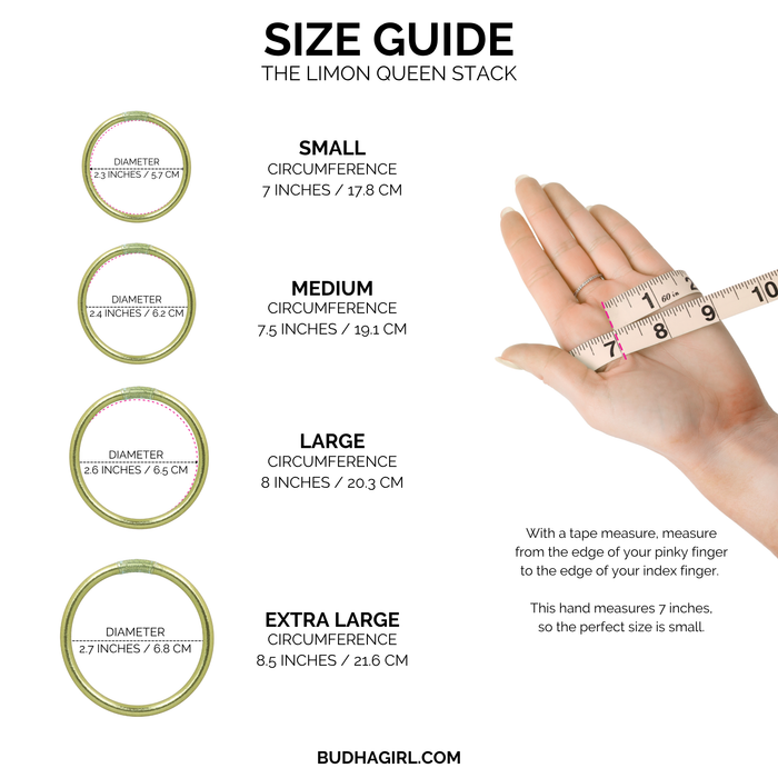 a hand holding a measuring tape