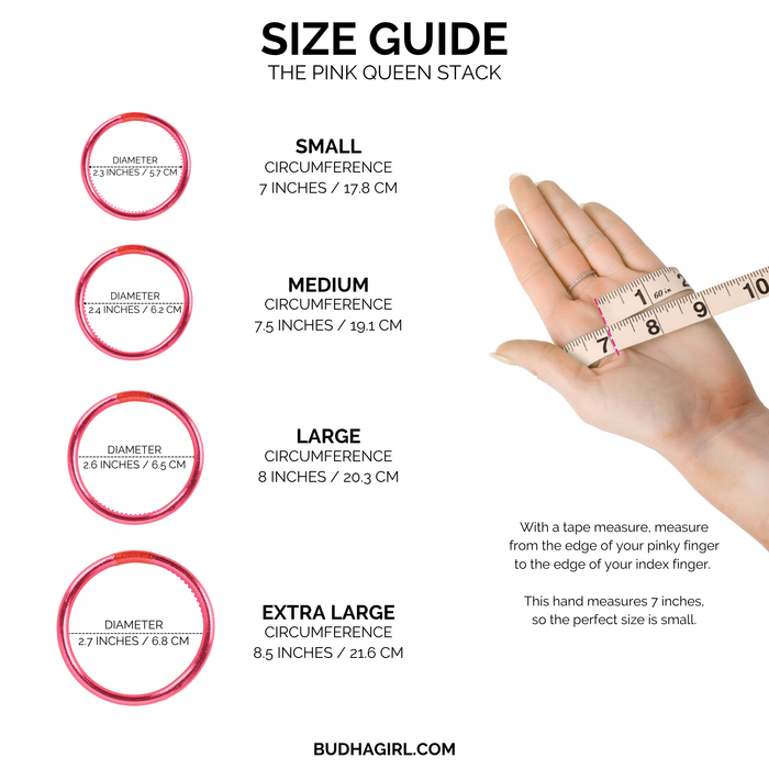 a hand holding a measuring tape