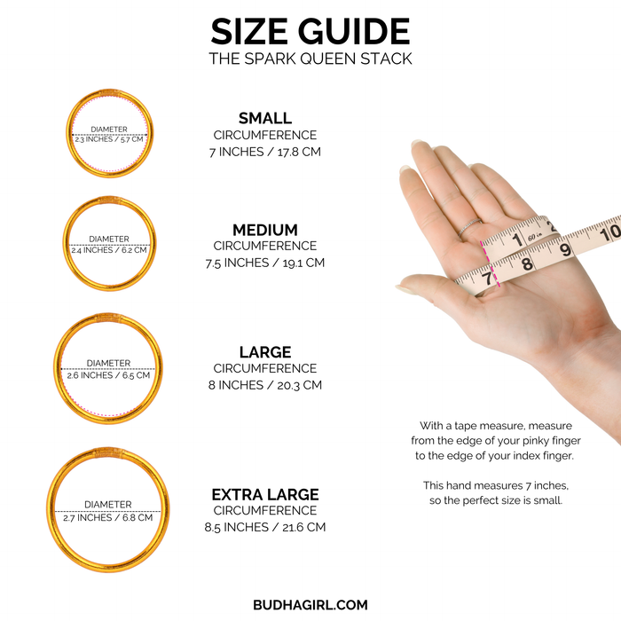 a hand holding a measuring tape