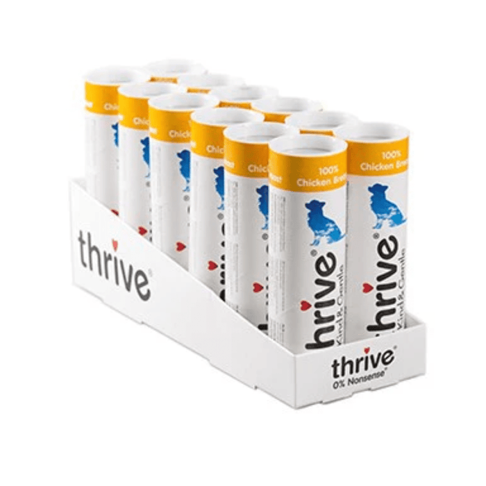 White background with a 12 pack of Thrive Kind & Gentle dog treats.
