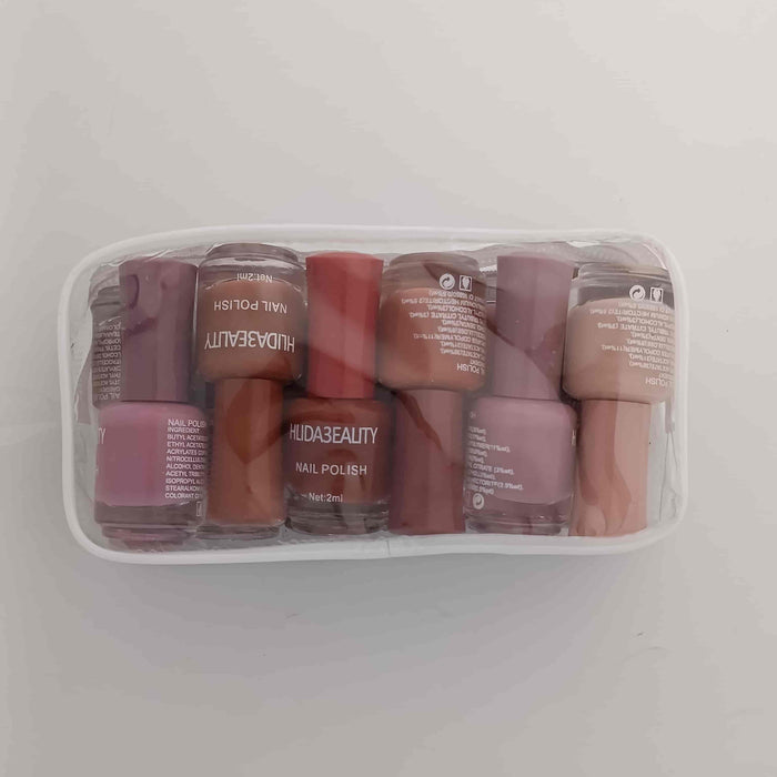12-Piece Nude Shades Nail Polish Set with neutral colors and cosmetic pouch available at Lotshop.pk