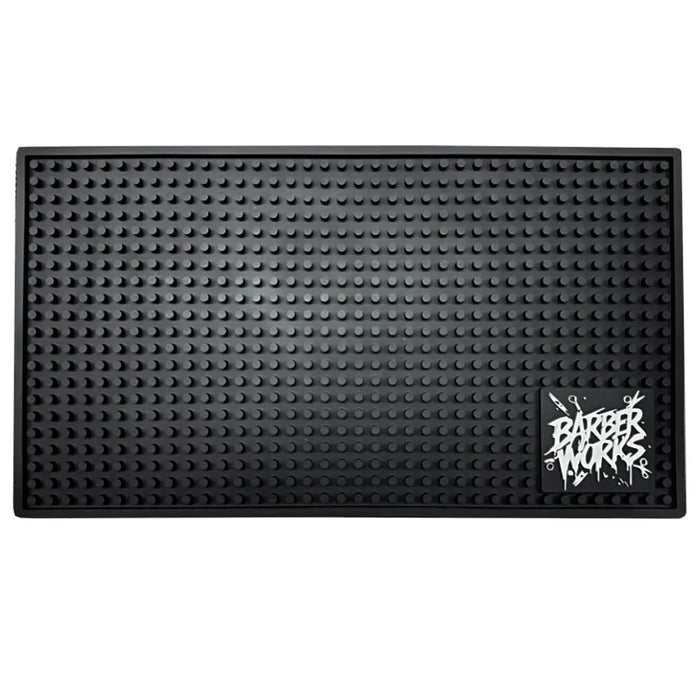 “Heat‑resistant Barber Works tool mat 17.5 × 10 inches on Las Vegas barbershop workstation”