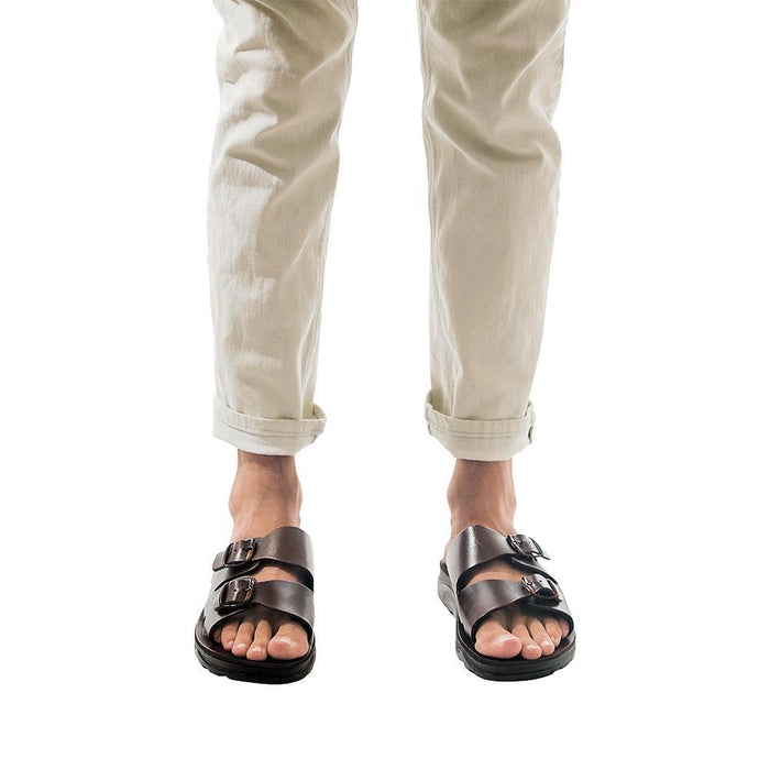 Model wearing Barnabas Brown, handmade leather slide sandals