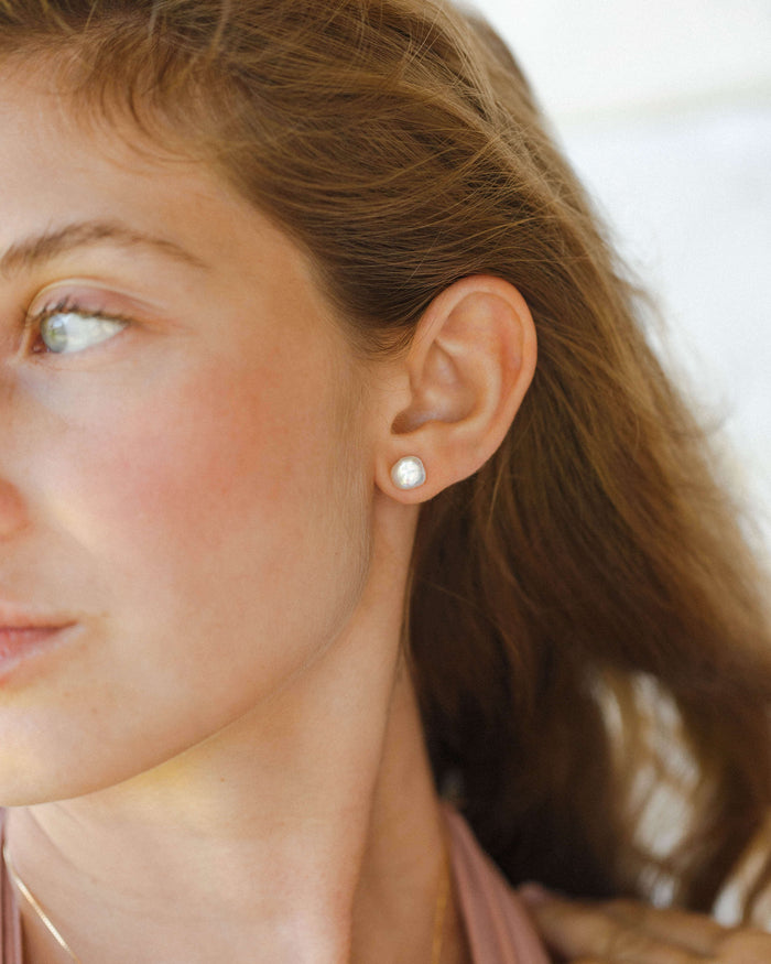 GLDN organic freshwater pearl studs.