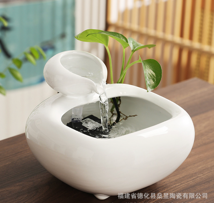 Ceramic small flowing water ornament