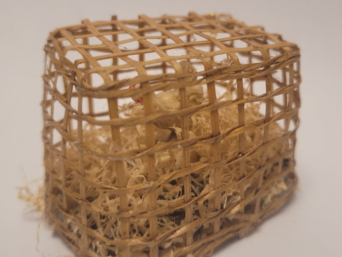 Chicken inside Bamboo Crate