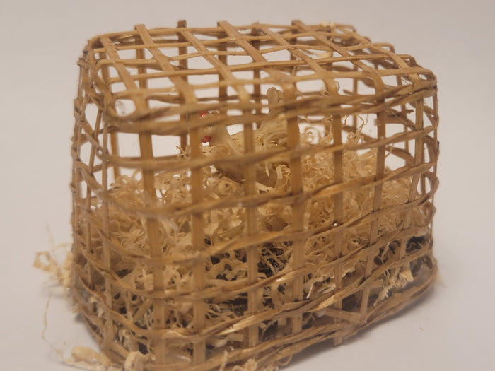Chicken inside Bamboo Crate