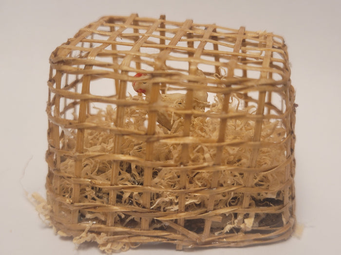 Chicken inside Bamboo Crate