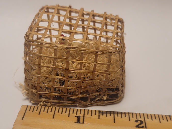 Chicken inside Bamboo Crate