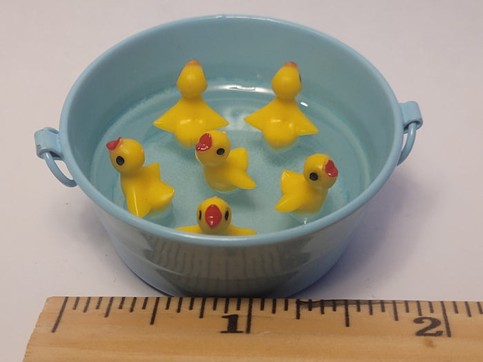 Chirping Ducklings in Blue Galvanized Tub