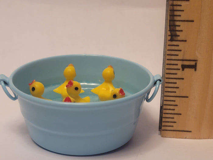 Chirping Ducklings in Blue Galvanized Tub