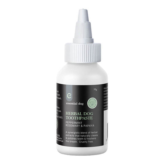 Bottle of essential dog herbal dog toothpaste on a white background.