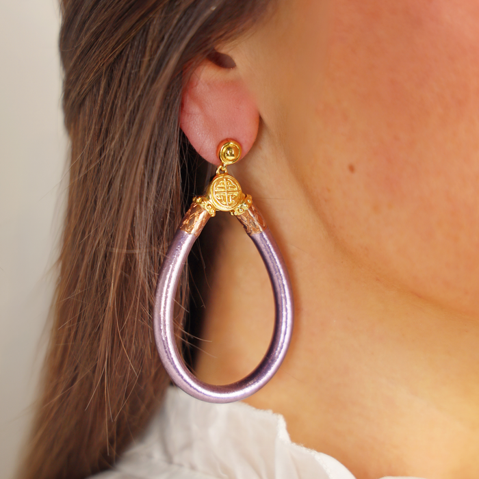 a close up of a woman's ear