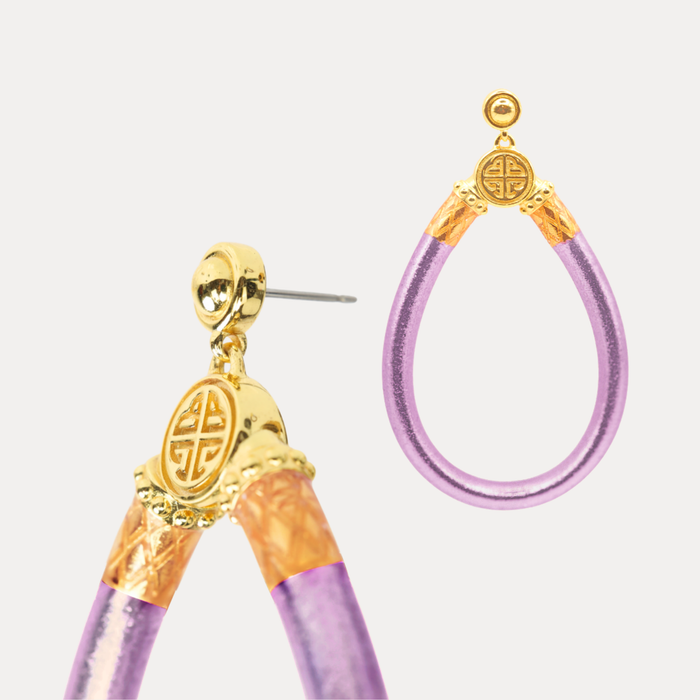 a close up of a pair of earrings