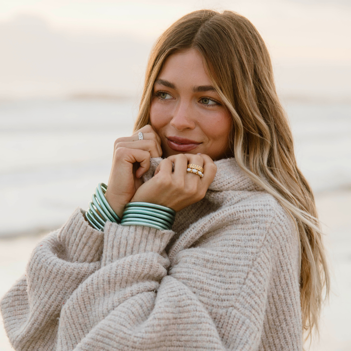 a woman in a sweater