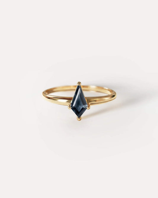 Vermeil or 10k Solid Gold ring with a marquise-shaped  Midnight Blue Sapphire on a white background, plp_main; Material: Vermeil, 10k Solid Gold,