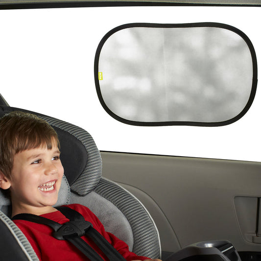 A smiling child in a car seat looks out the window, which is covered by the Pop Open Cling Shade Set (2 Pack) in gray to block sun glare.
