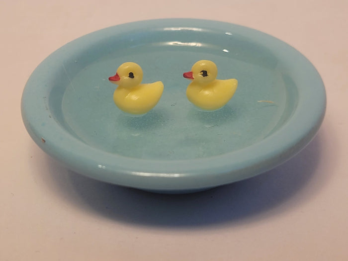 Rubber Ducks in Blue Wash Basin