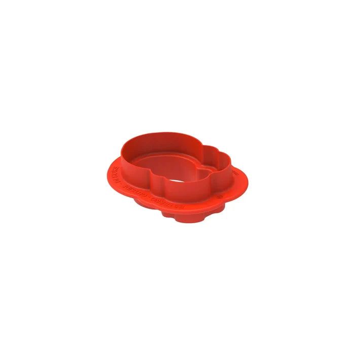 Red plastic component on a white background