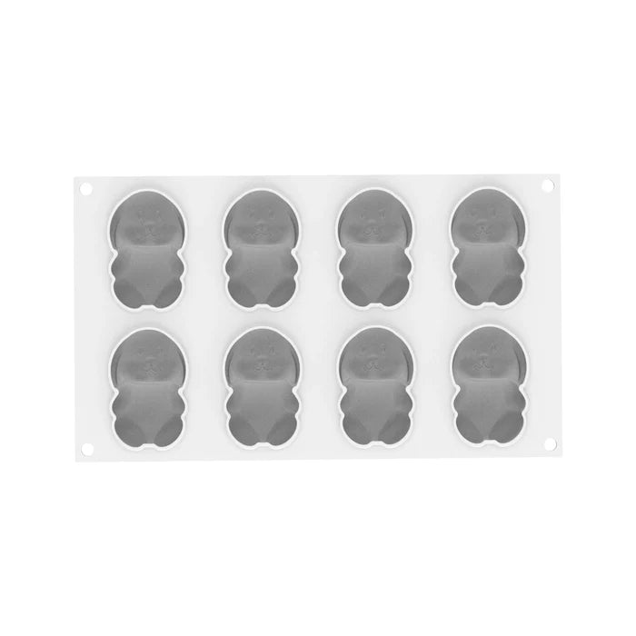 Silicone mold with rabbit shaped cavities on a white background