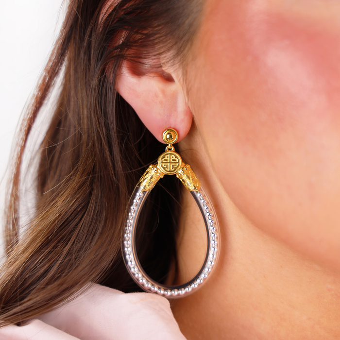 a close up of a woman's ear
