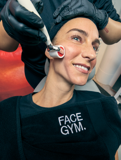 a woman getting a face massage