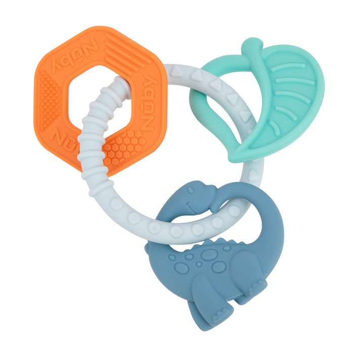 The Nuby Soft Silicone Chewy Charms Teething Ring features an orange hexagon, mint green leaf, and blue dinosaur attached to a white ring with textured bumps for gentle teething relief.