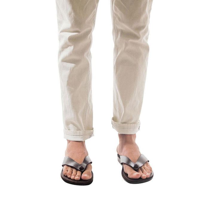 Model wearing Solomon brown, handmade leather slide sandals