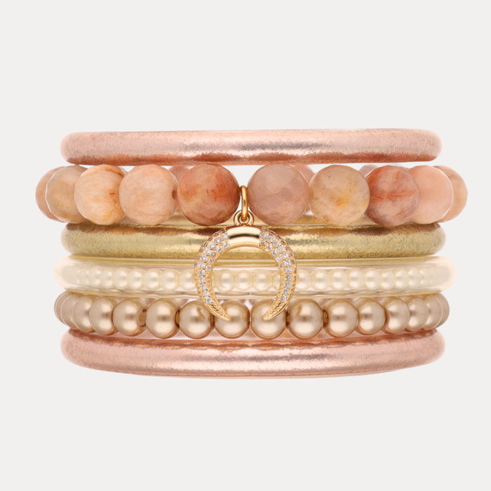 a stack of bracelets with beads