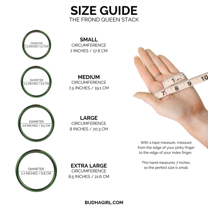 a hand holding a measuring tape