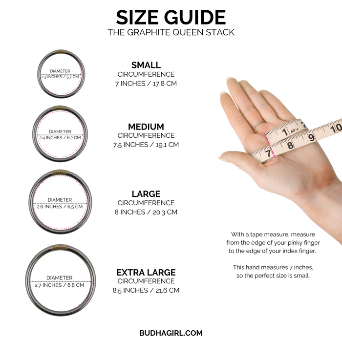 a hand holding a measuring tape