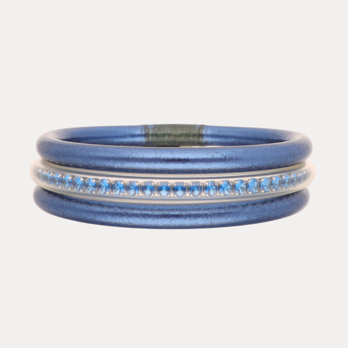 a blue bracelet with blue stones