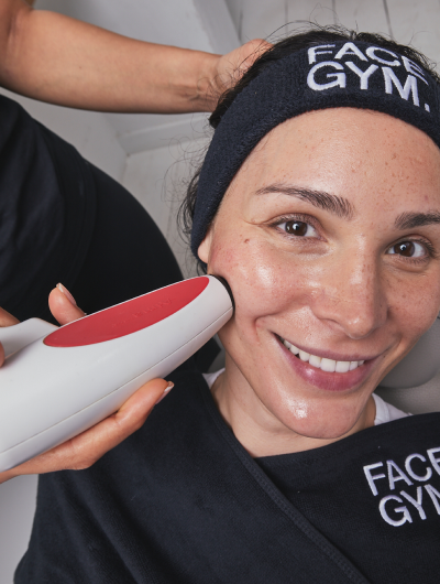 a woman getting a face massage