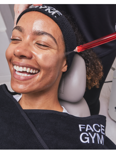 a woman getting a face injection