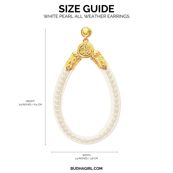 a white and gold oval shaped earring with a gold and white pearl bead